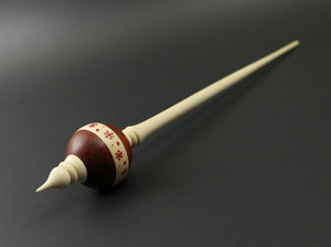 Bead spindle in redheart and holly