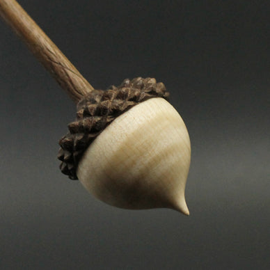 Acorn support spindle in curly maple and walnut