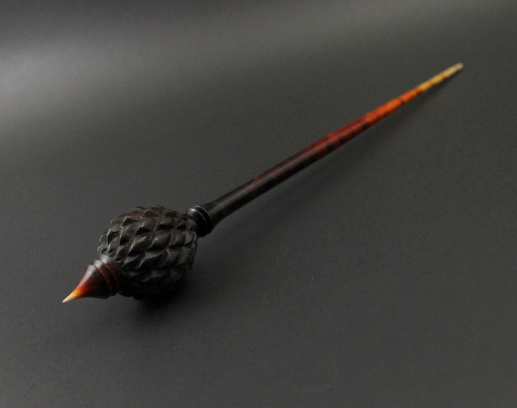 Dragon egg bead spindle in Indian ebony and hand dyed curly maple