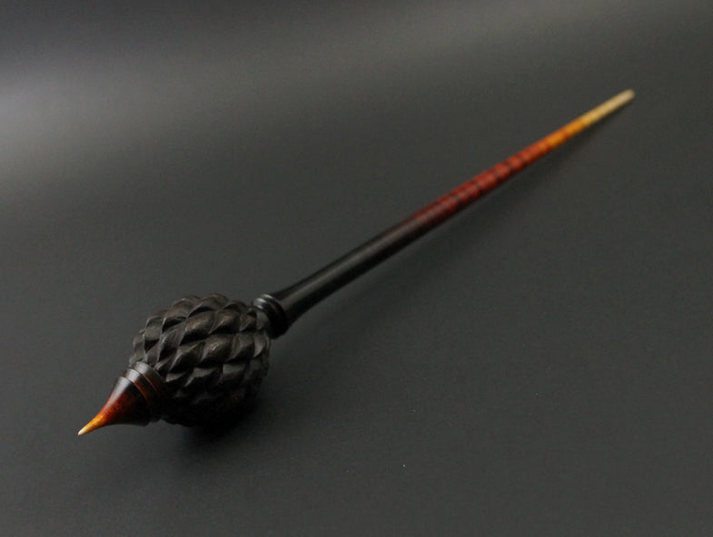 Dragon egg bead spindle in Indian ebony and hand dyed curly maple