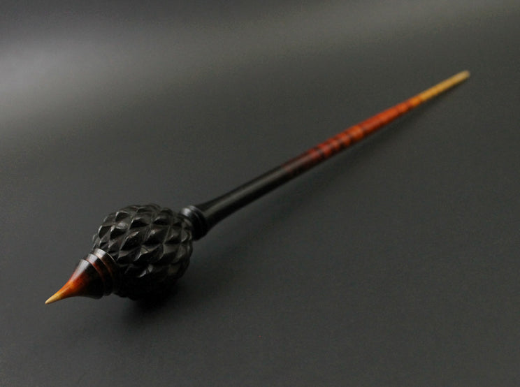 Dragon egg bead spindle in Indian ebony and hand dyed curly maple