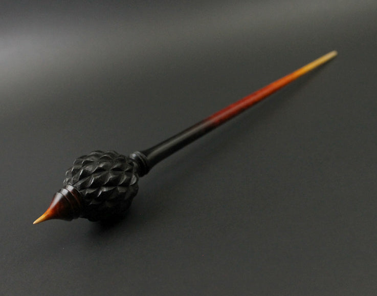 Dragon egg bead spindle in African blackwood and hand dyed curly maple