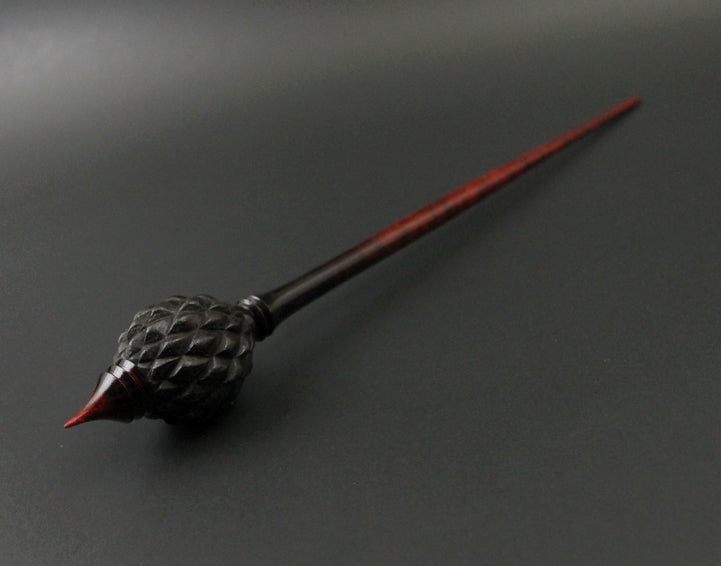 Dragon egg bead spindle in African blackwood and hand dyed curly maple