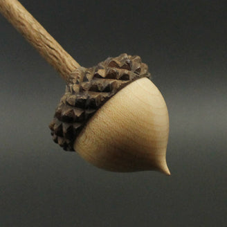 Acorn support spindle in maple and walnut