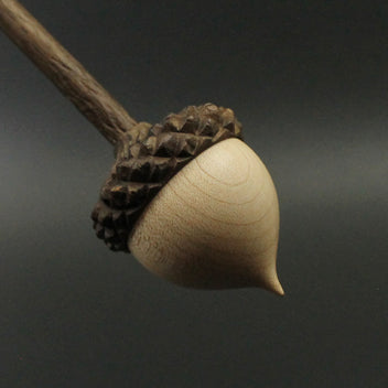 Acorn support spindle in maple and walnut