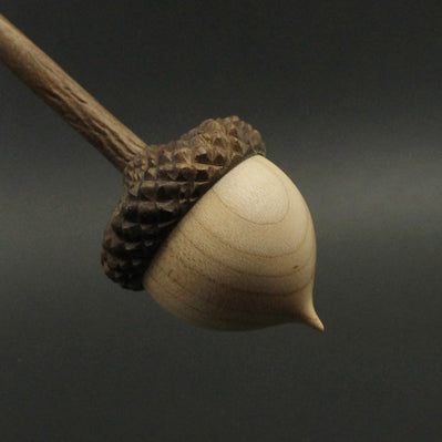 Acorn support spindle in maple and walnut