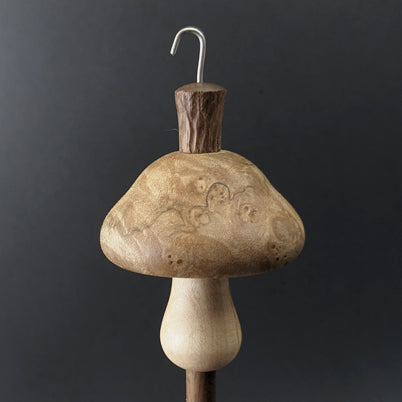 Mushroom drop spindle in maple burl, curly maple, and walnut