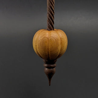 Pumpkin bead spindle in osage orange and walnut