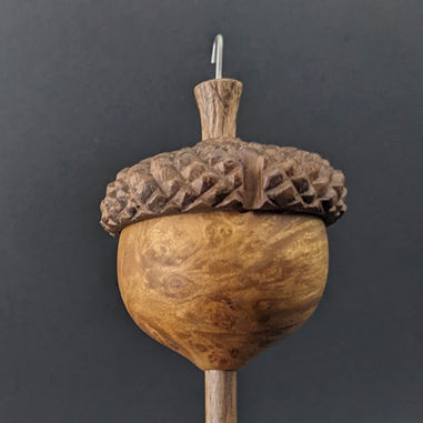 Acorn drop spindle in hand dyed maple burl and walnut