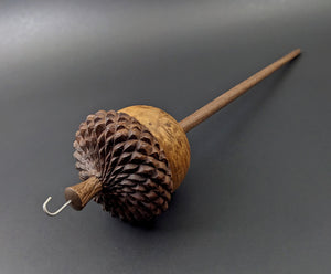 Acorn drop spindle in hand dyed maple burl and walnut