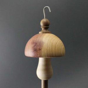 Mushroom drop spindle in red cedar, curly maple, and walnut