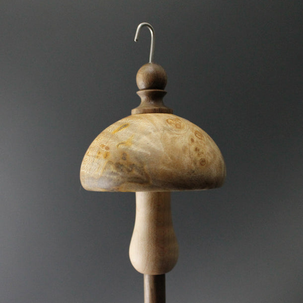 Drop spindle in maple burl, curly maple, and walnut