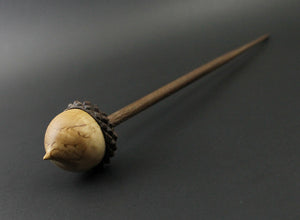 Acorn support spindle in Karelian birch and walnut