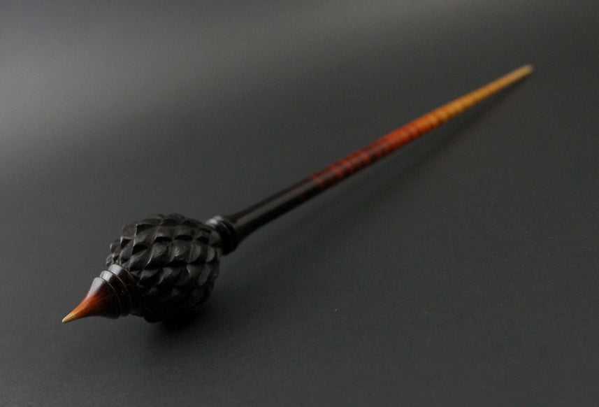 Dragon egg bead spindle in Indian ebony and hand dyed curly maple