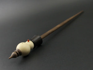 Snowman support spindle in holly, Indian ebony, and walnut