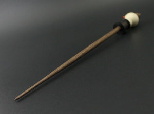 Snowman support spindle in holly, Indian ebony, and walnut