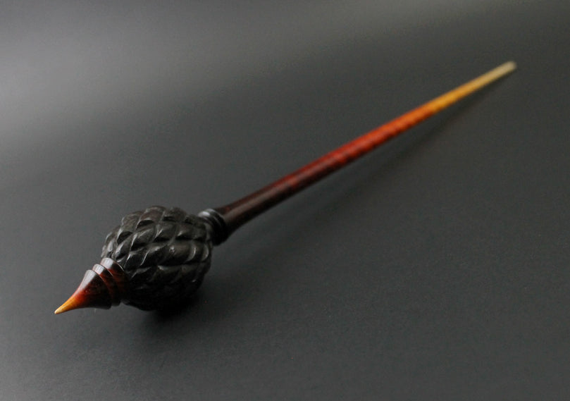 Dragon egg bead spindle in Indian ebony and hand dyed curly maple