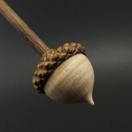 Acorn support spindle in curly maple and walnut