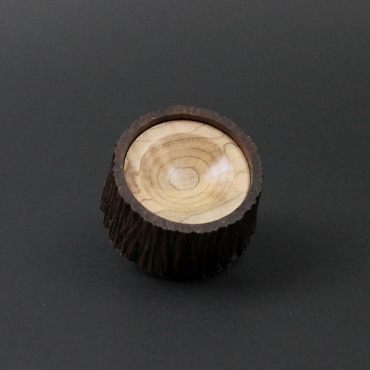 Spinning bowl in walnut and curly maple