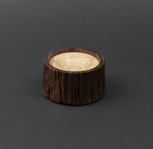 Spinning bowl in walnut and curly maple