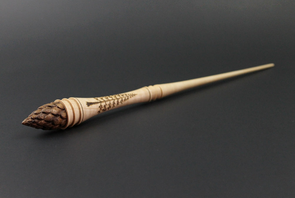 Wand spindle in curly maple and walnut