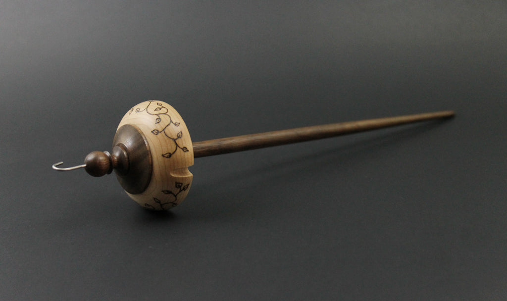 Drop spindle in curly maple and walnut