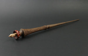 Wand spindle in walnut, redheart, and curly maple