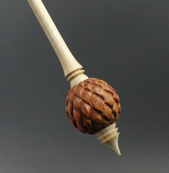 Dragon egg bead spindle in bloodwood and curly maple