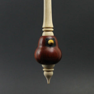 Cardinal bead spindle in redheart, yellowheart, and curly maple